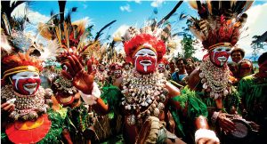 Papua New Guinea traditional tribes men carrying out dancing ritual
