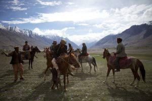 Horsemen in the Wakhan Corridor lineup a game of buzkashi